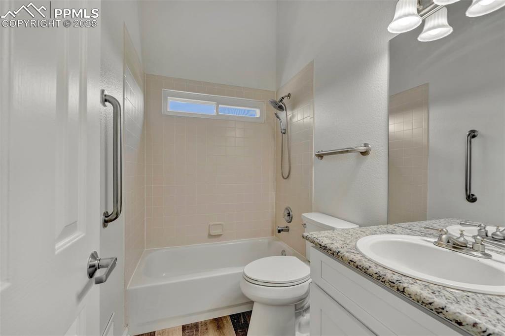 7841 Fort Smith Road Peyton, CO 80831 - Photo 15 of 37 Main floor bathroom.