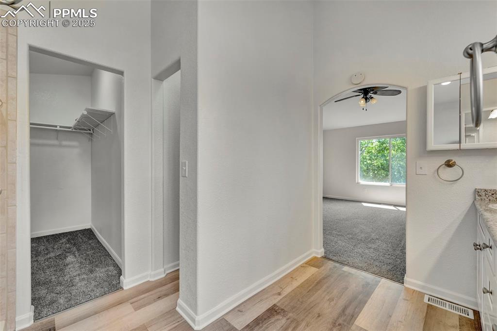 7841 Fort Smith Road Peyton, CO 80831 - Photo 16 of 37 Additional main floor bath features another lovely luxury vinyl plank flooring.