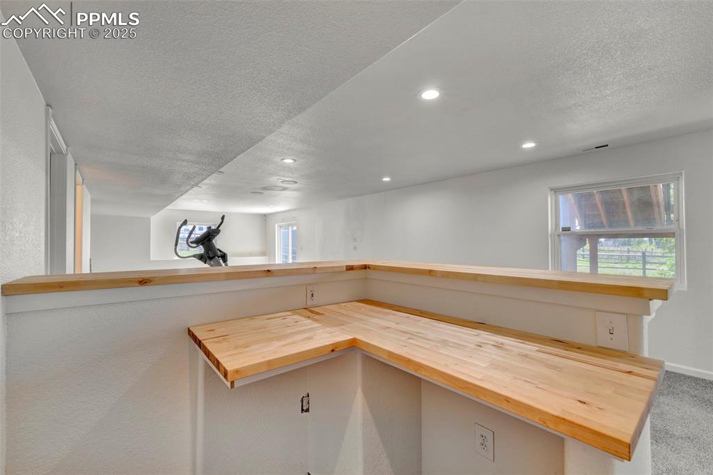 7841 Fort Smith Road Peyton, CO 80831 - Photo 24 of 37 Showcasing tasteful butcher block counters.