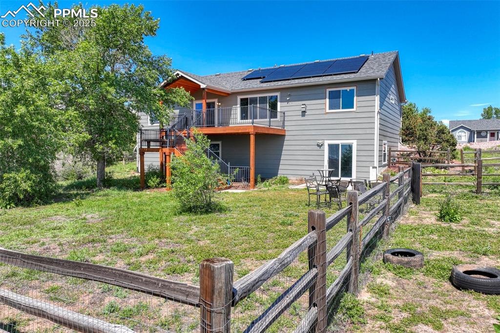 7841 Fort Smith Road Peyton, CO 80831 - Photo 26 of 37 Fenced in back yard showcasing a rustic flare.