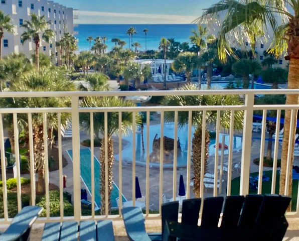 a bathroom with a tub a sink shower and mirror
