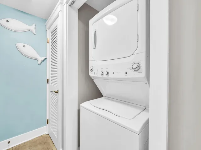 a view of a table and chairs in the patio