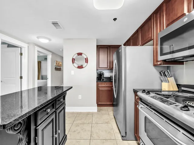 a lobby with furniture and a large window