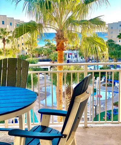 a bedroom with a bed and a mirror