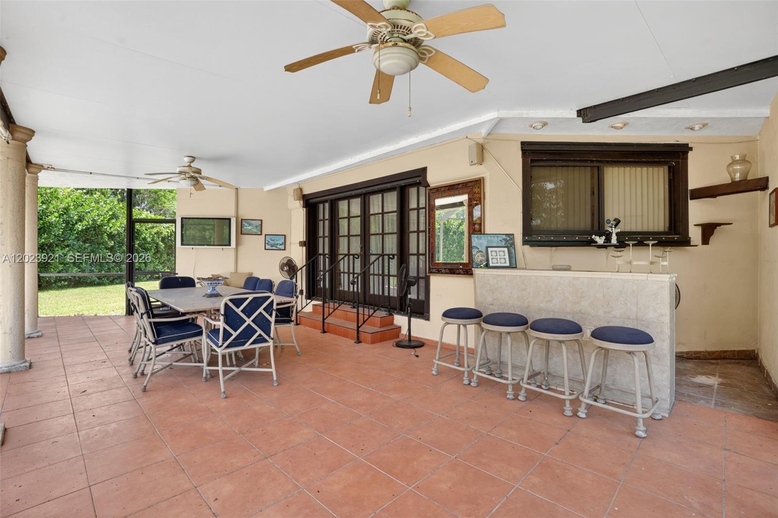 8461 Southwest 68th St Road Miami, FL 33143 - Photo 13 of 65 a dining room with furniture and a large window