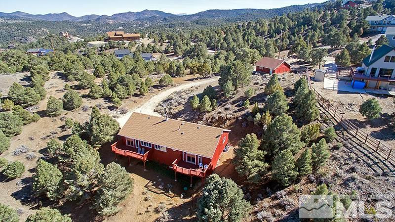 21450 Delta Drive Reno, NV 89521 - Photo 1 of 1 an aerial view of a house with a mountain