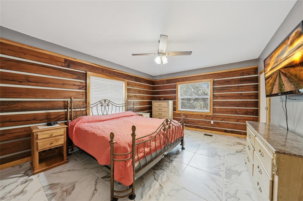 9796 Southwest Southern Dreams Road Arcadia, FL 34269 - Photo 20 of 72 a bedroom with a bed and window