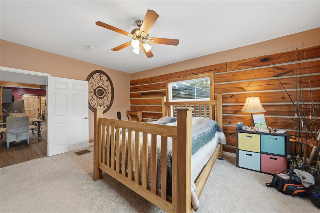 9796 Southwest Southern Dreams Road Arcadia, FL 34269 - Photo 29 of 72 a view of a hallway with workspace and a window