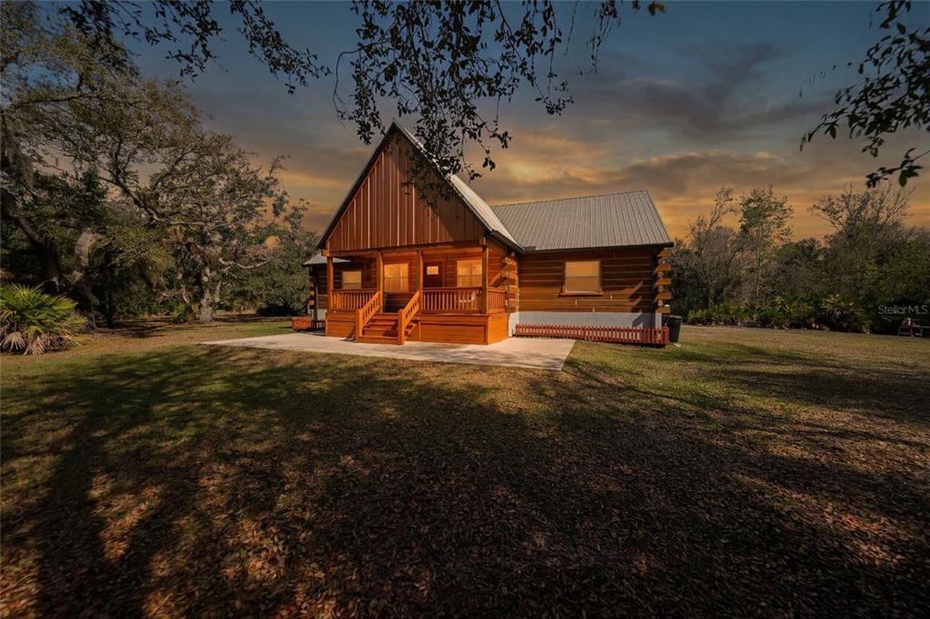 9796 Southwest Southern Dreams Road Arcadia, FL 34269 - Photo 3 of 72 a view of a house with a yard
