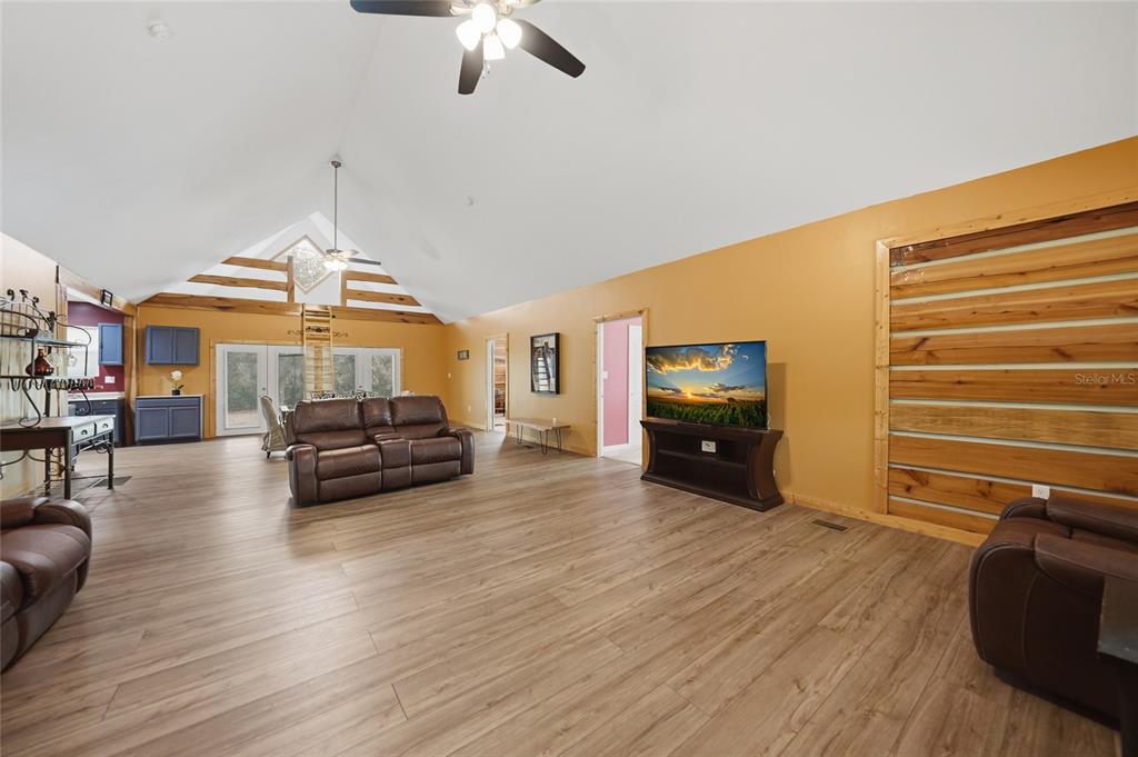 9796 Southwest Southern Dreams Road Arcadia, FL 34269 - Photo 8 of 72 a living room with furniture and a flat screen tv