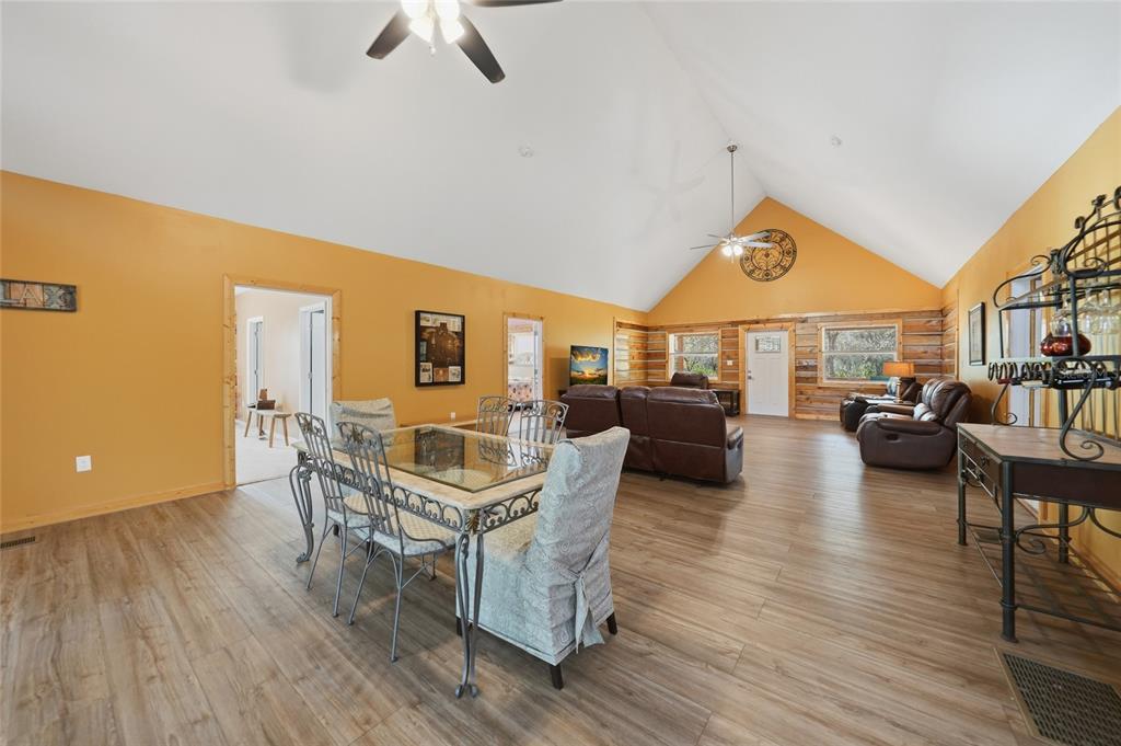 9796 Southwest Southern Dreams Road Arcadia, FL 34269 - Photo 9 of 72 a living room with furniture and a wooden floor