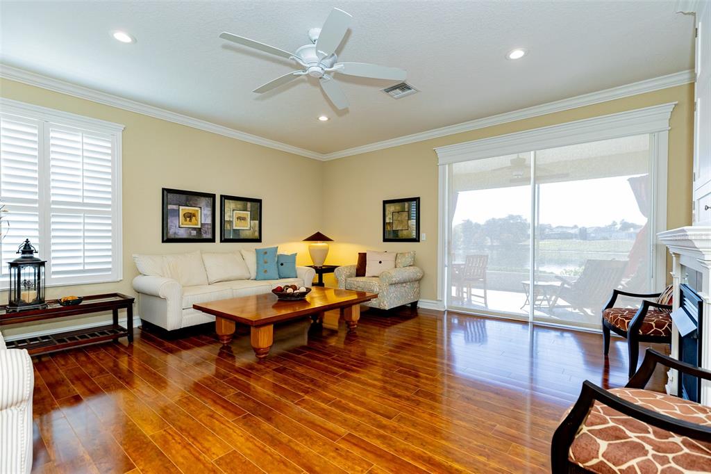 1250 Southwest 152nd Lane Ocala, FL 34473 - Photo 28 of 88 a living room with furniture and a wooden floor