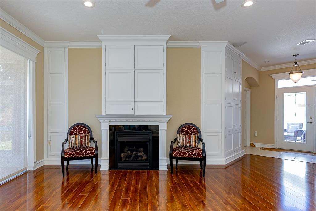 1250 Southwest 152nd Lane Ocala, FL 34473 - Photo 31 of 88 a living room with furniture and a fireplace