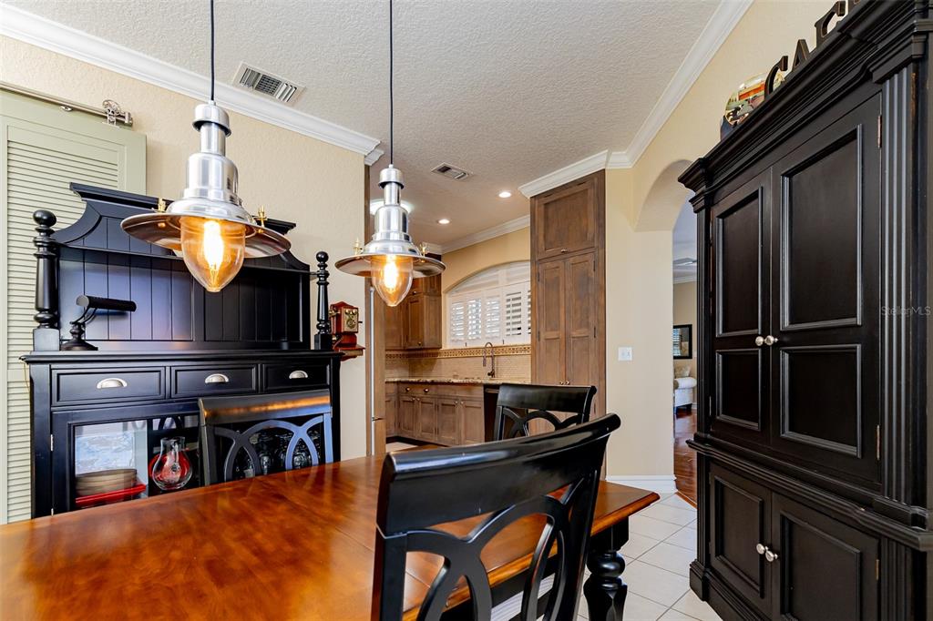 1250 Southwest 152nd Lane Ocala, FL 34473 - Photo 40 of 88 a kitchen with stainless steel appliances granite countertop a sink a stove and a refrigerator