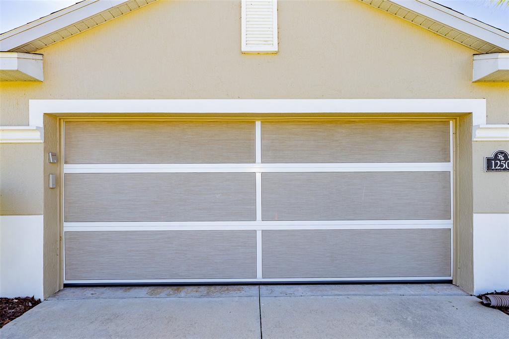 1250 Southwest 152nd Lane Ocala, FL 34473 - Photo 7 of 88 a view of a room with wooden floor and a window