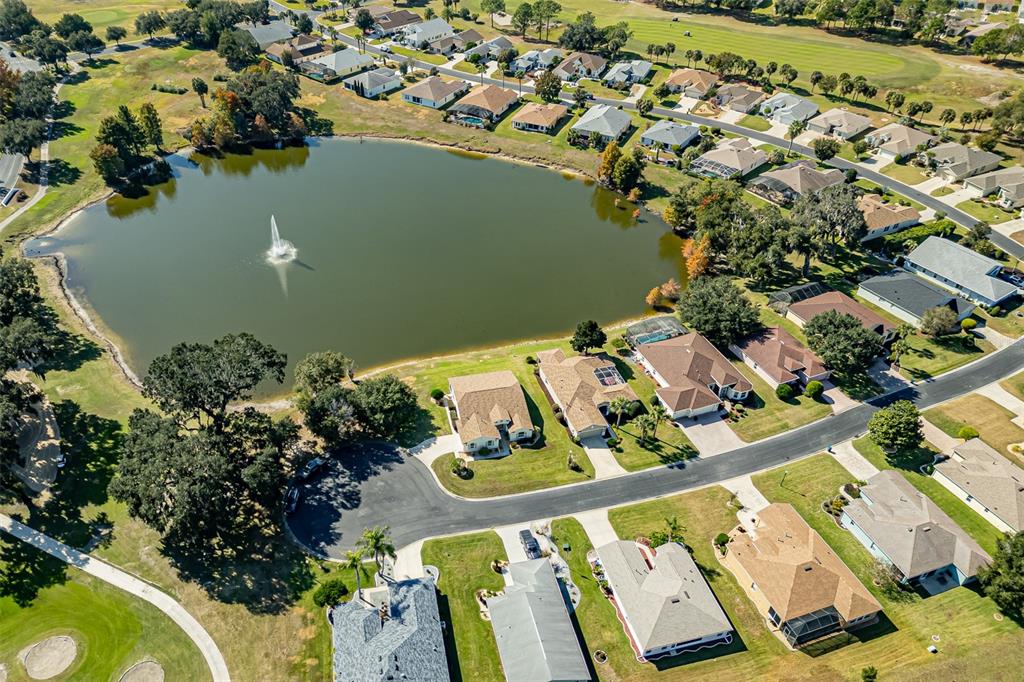 1250 Southwest 152nd Lane Ocala, FL 34473 - Photo 77 of 88 an aerial view of a house with swimming pool and outdoor seating