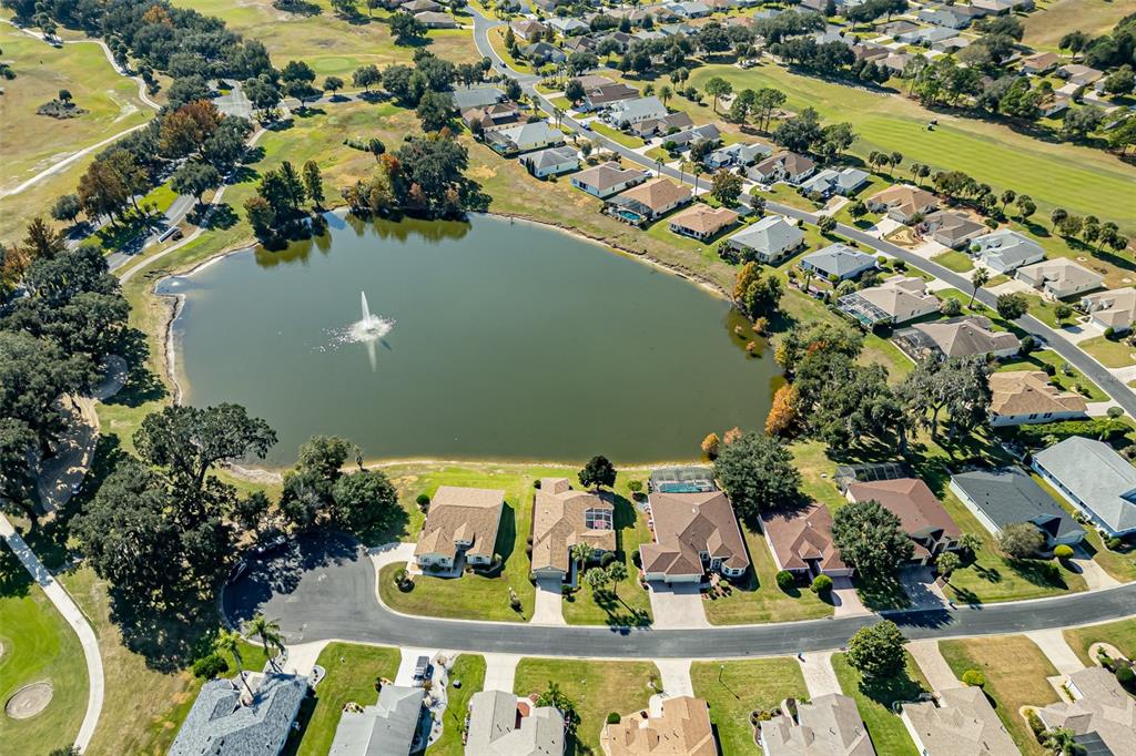 1250 Southwest 152nd Lane Ocala, FL 34473 - Photo 78 of 88 an aerial view of a house with a yard and lake view