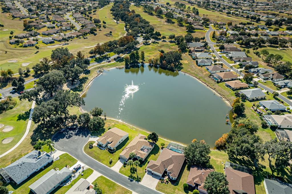 1250 Southwest 152nd Lane Ocala, FL 34473 - Photo 79 of 88 an aerial view of residential house with outdoor space and lake view