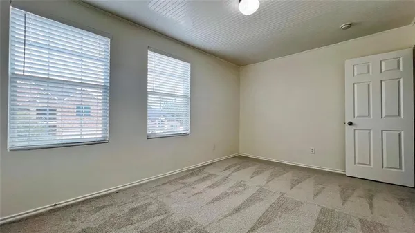 an empty room with an entryway