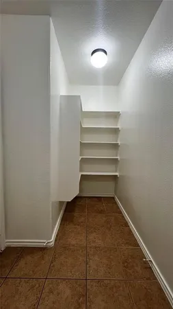 a view of a room with a staircase