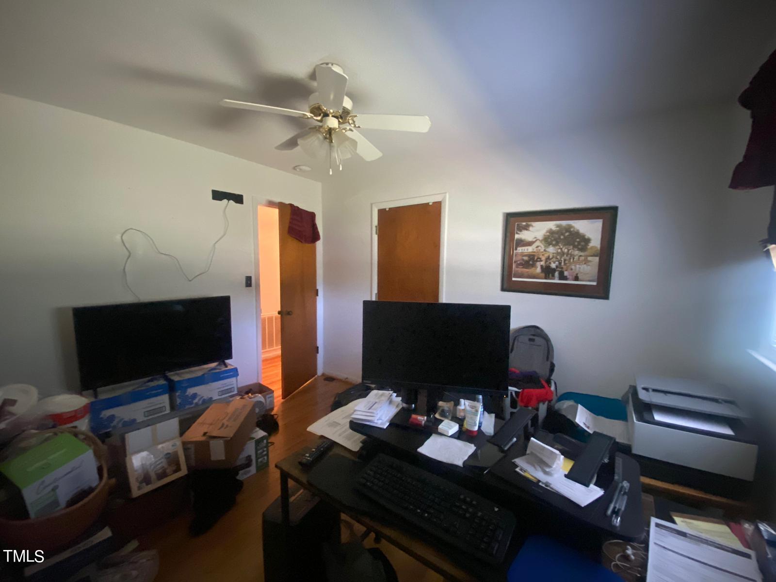 3933 Lizard Lick Road Wendell, NC 27591 - Photo 20 of 25 a room with furniture and a flat screen tv