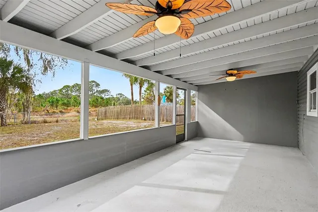 a view of a room with a lot of windows