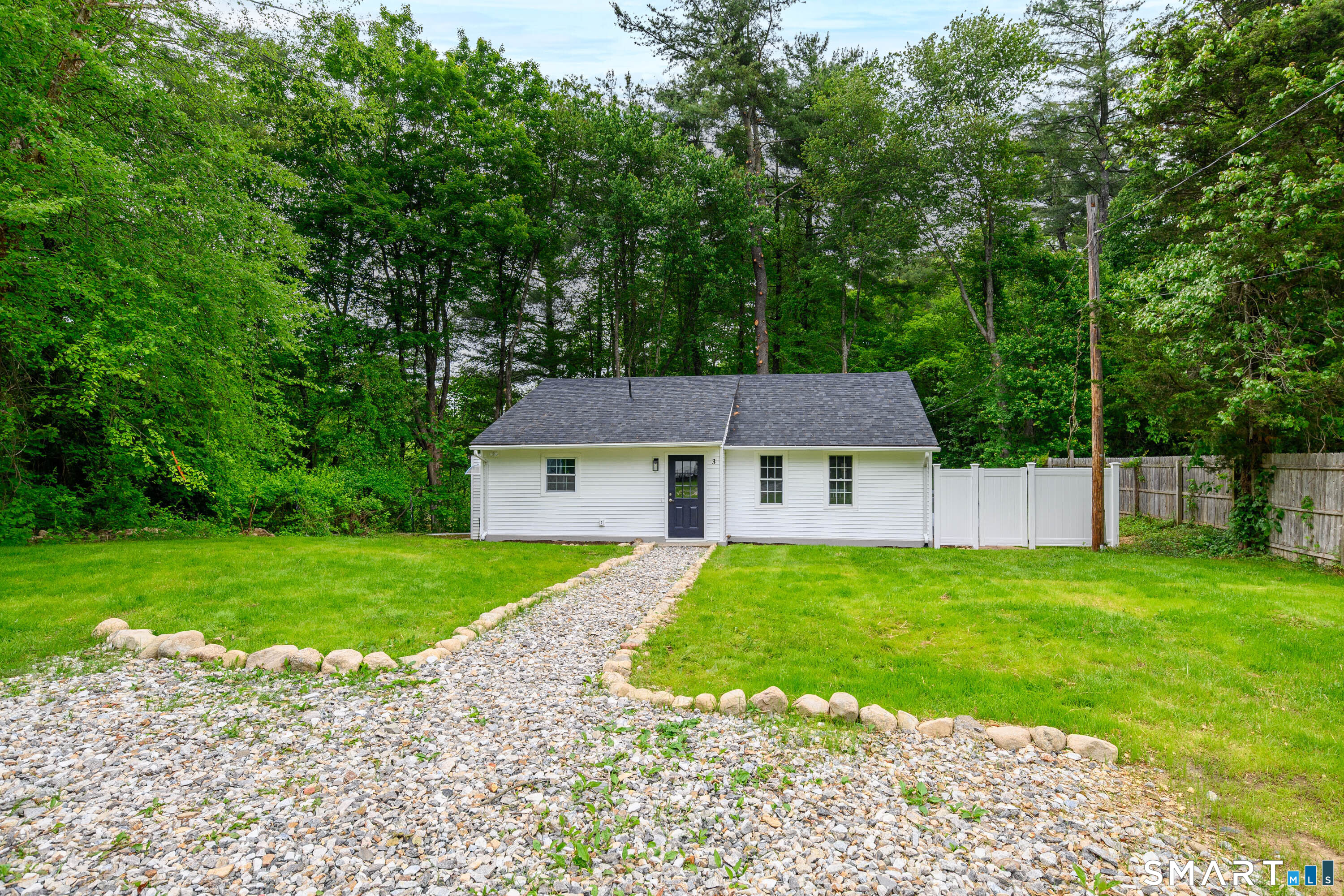 3 Botsford Hill Road Newtown, CT 06470 - Photo 2 of 25 Welcoming front exterior with charming stone-lined walkway and level yard.