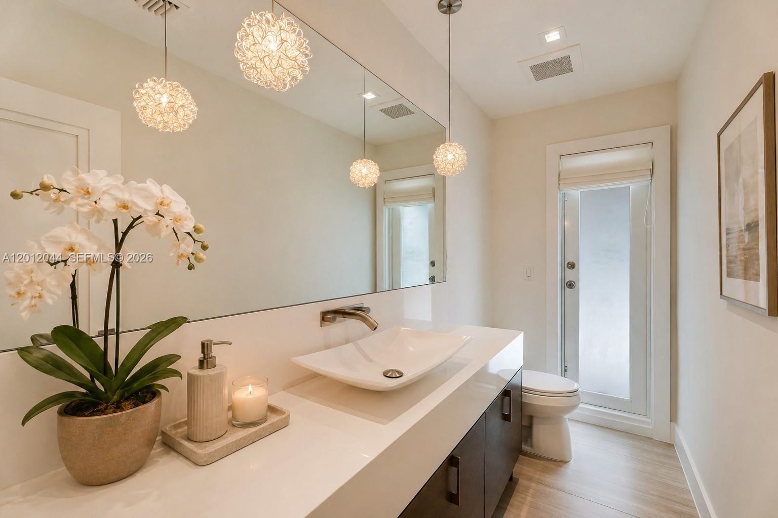 449 Miller Road Coral Gables, FL 33146 - Photo 16 of 70 Guest bathroom - Image virtually staged