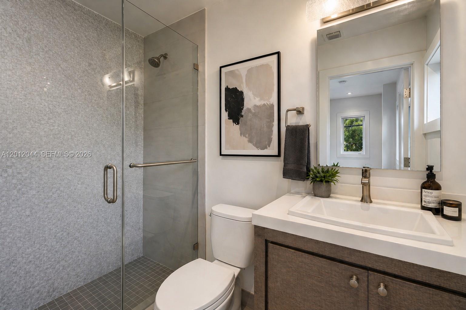 449 Miller Road Coral Gables, FL 33146 - Photo 38 of 70 Third en-suite bathroom upstairs - Image virtually staged