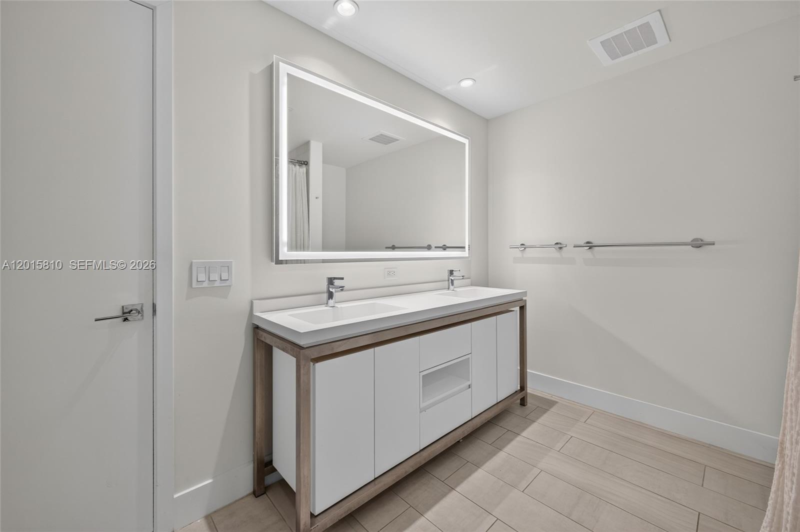 2000 Metropica Way, Unit 1902 Sunrise, FL 33323 - Photo 22 of 40 a utility room with sink dryer and washer