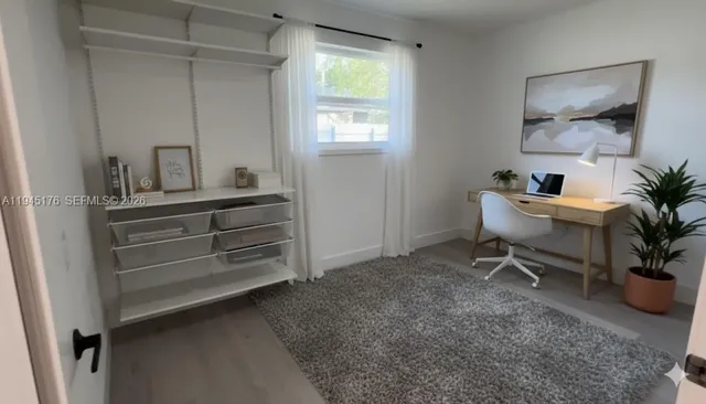 a room with furniture and window