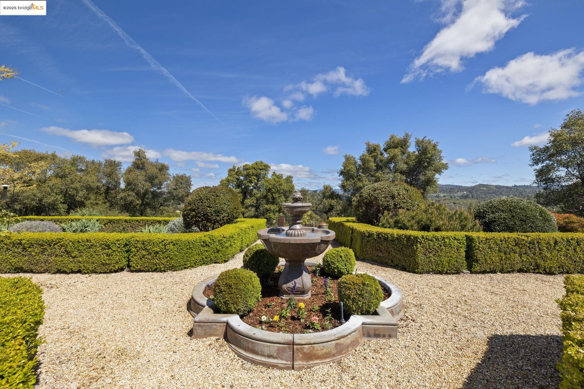 10270 Slate Rim Road Sonora, CA 95370 - Photo 46 of 55 a view of a garden with an outdoor seating