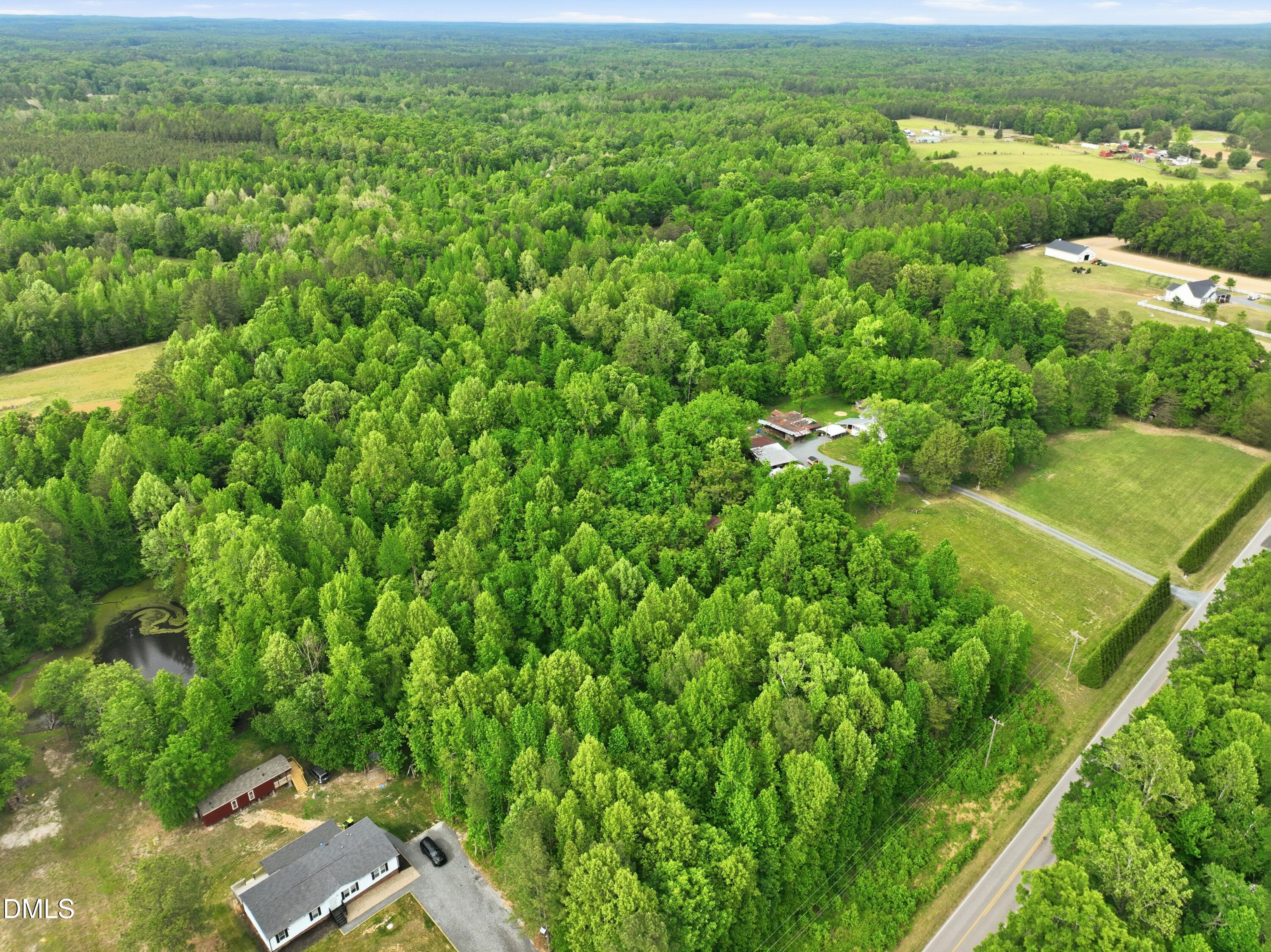 0 George Sherman Road Rougemont, NC 27572 - Photo 12 of 14 an aerial view of a residential houses with outdoor space and trees all around