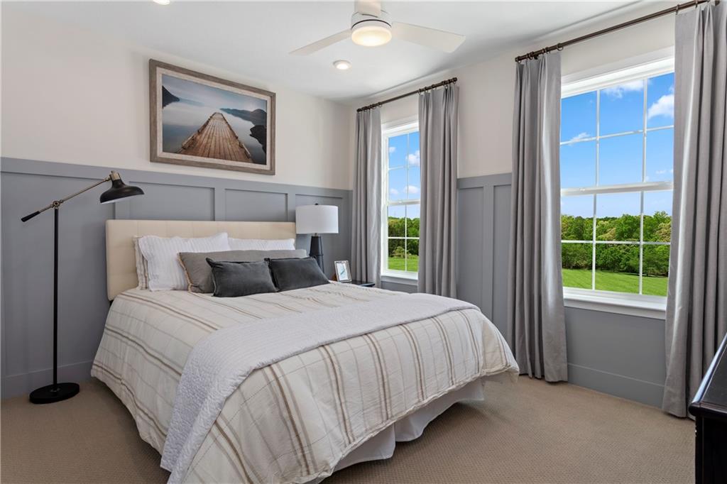 115 Affinity Drive Harmony, PA 16037 - Photo 8 of 16 a bedroom with a bed and a window