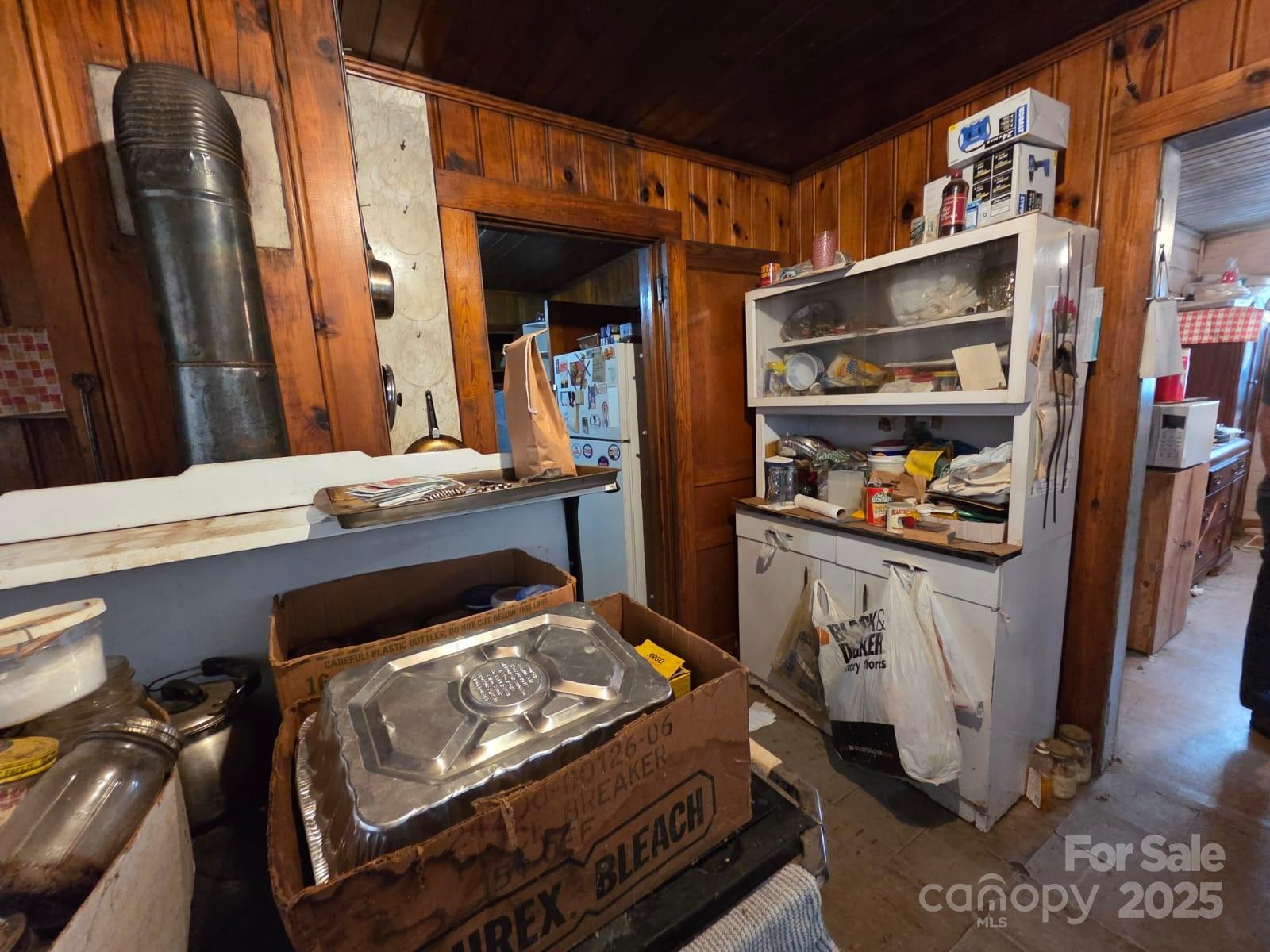 4992 Leger Road Connelly Springs, NC 28612 - Photo 25 of 40 a kitchen with a stove and a refrigerator