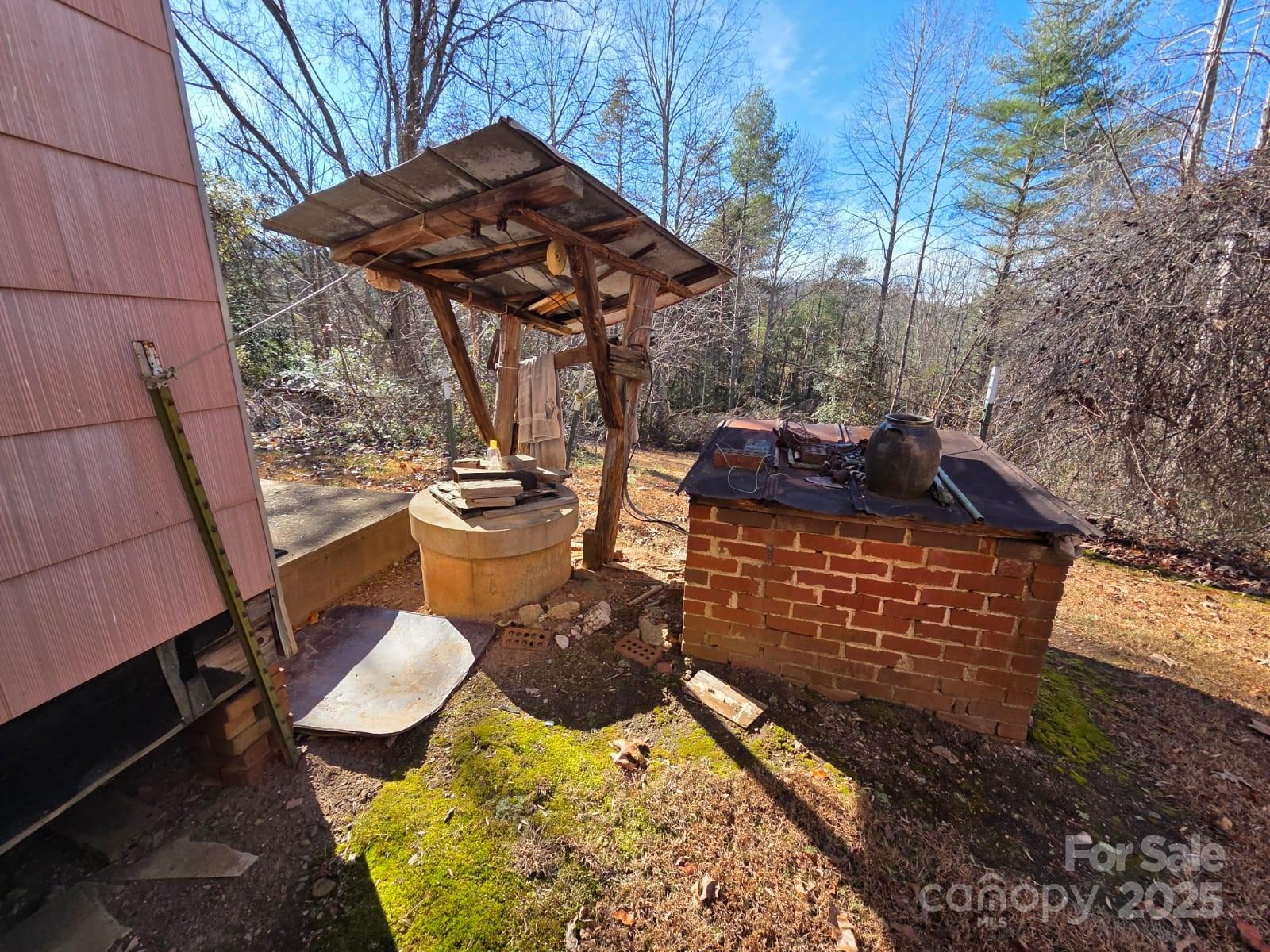 4992 Leger Road Connelly Springs, NC 28612 - Photo 3 of 40 a view of a chairs and table in the patio