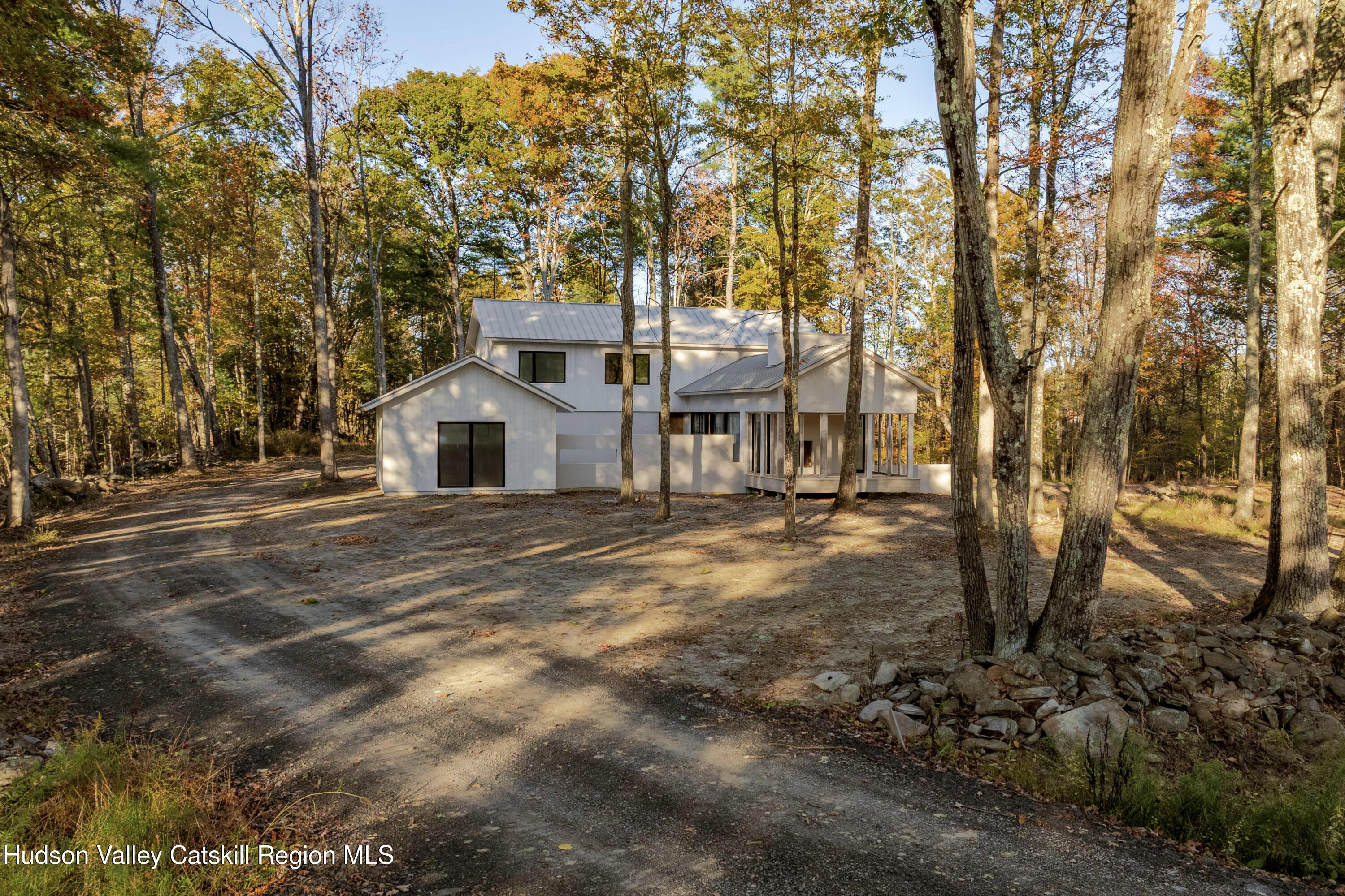 a house with trees in front of it