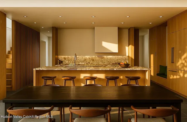 a view of kitchen island with stainless steel appliances granite countertop dining table chairs sink and wooden floor