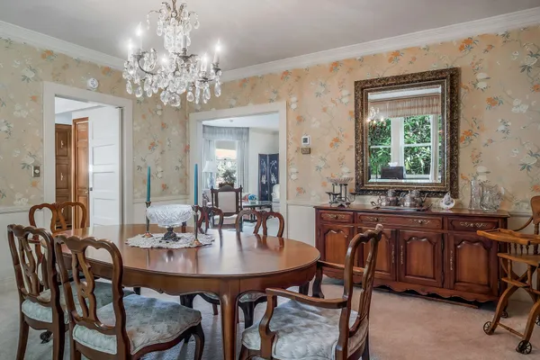 a kitchen with a sink appliances and cabinets