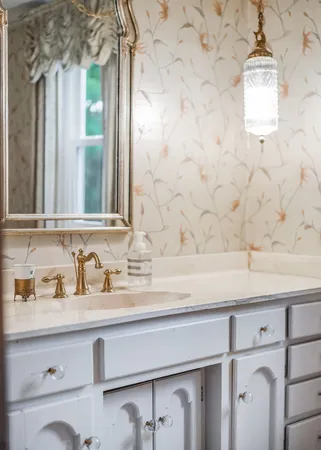 a bathroom with a sink a toilet and a bathtub