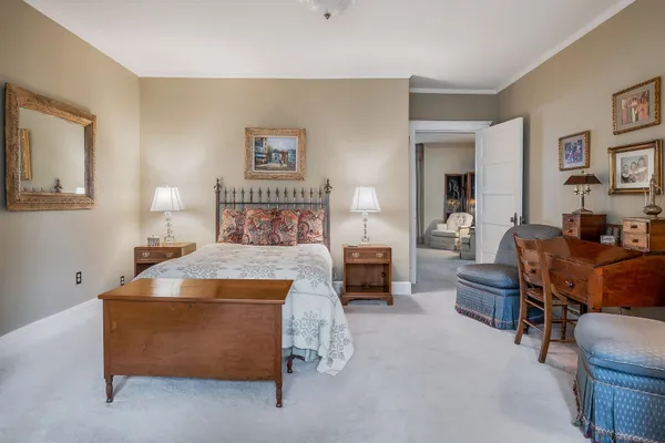 a view of staircase with a rug