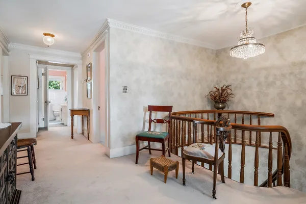 a spacious bedroom with a bed and a couch