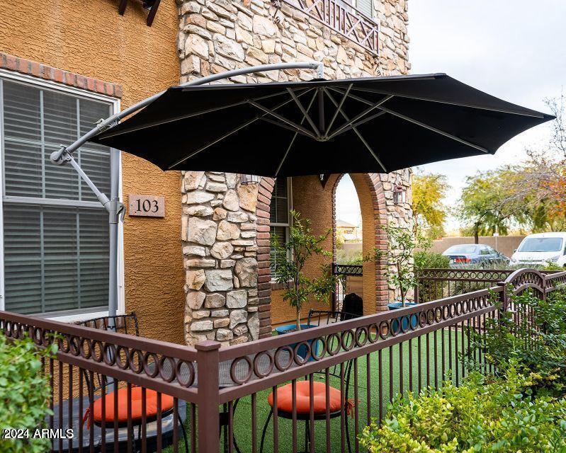 4757 East Waterman Street, Unit 103 Gilbert, AZ 85297 - Photo 2 of 27 a view of street from balcony