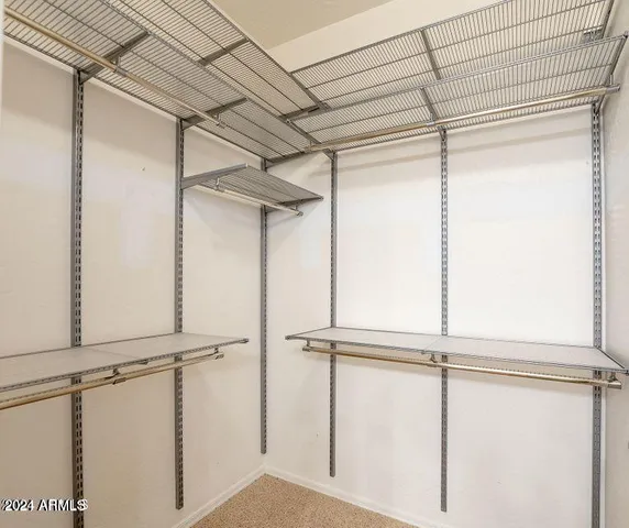 a view of a room with rack on the wall