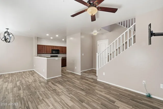 a view of a kitchen with a sink and cabinets