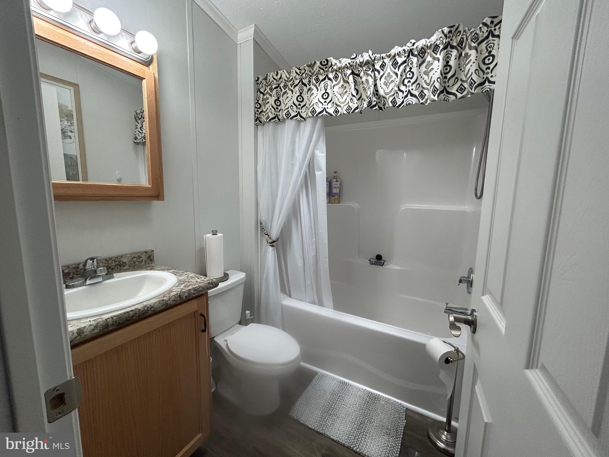 18 Jade Drive Lititz, PA 17543 - Photo 36 of 39 a bathroom with a granite countertop sink toilet and shower