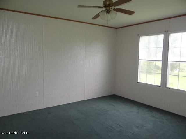 7529 Wiggins Mill Road Lucama, NC 27851 - Photo 6 of 12 7539 Wiggins Mill Bedroom