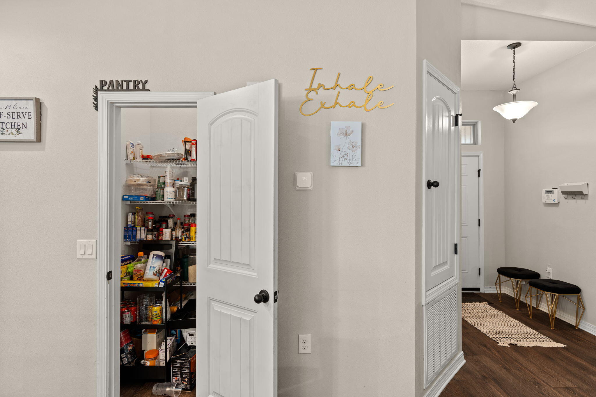 124 Lillian Way Crestview, FL 32536 - Photo 15 of 31 Pantry and Hallway to Bedroom