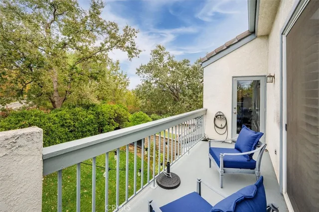 a view of a porch with furniture