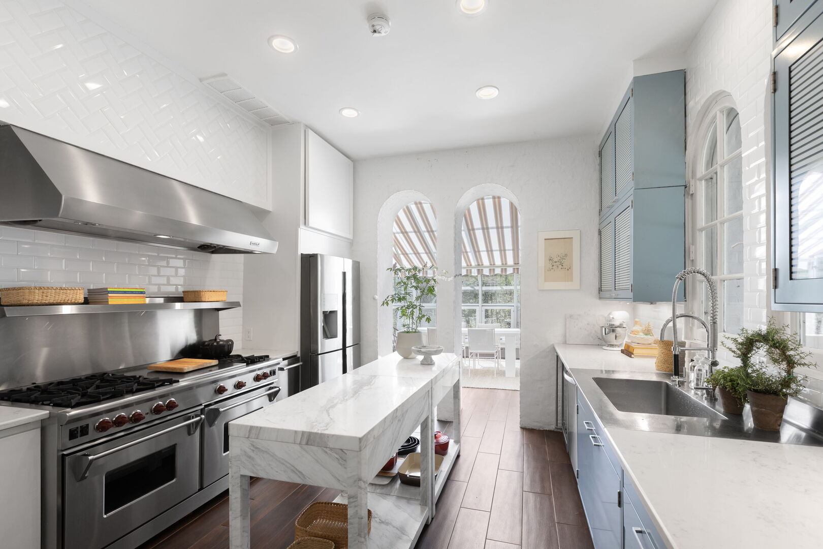 51 South Mayflower Road Lake Forest, IL 60045 - Photo 16 of 64 a kitchen with a stove a sink and a refrigerator